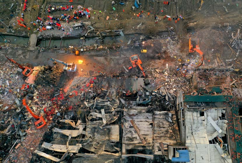 An aerial view of the site of an oil tank truck explosion on a highway in Wenling, Zhejiang province, June 14, 2020. The explosion left at least 19 people dead and injured up to 172, local authorities said. People Visual