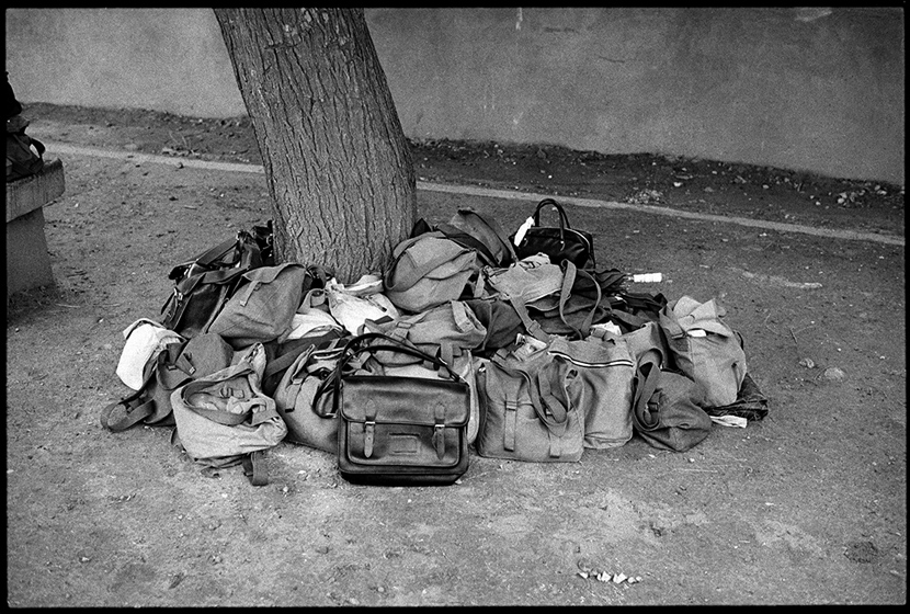 Candidates’ belongings piled under a tree, Beijing, 1981. Ren Shulin for Sixth Tone