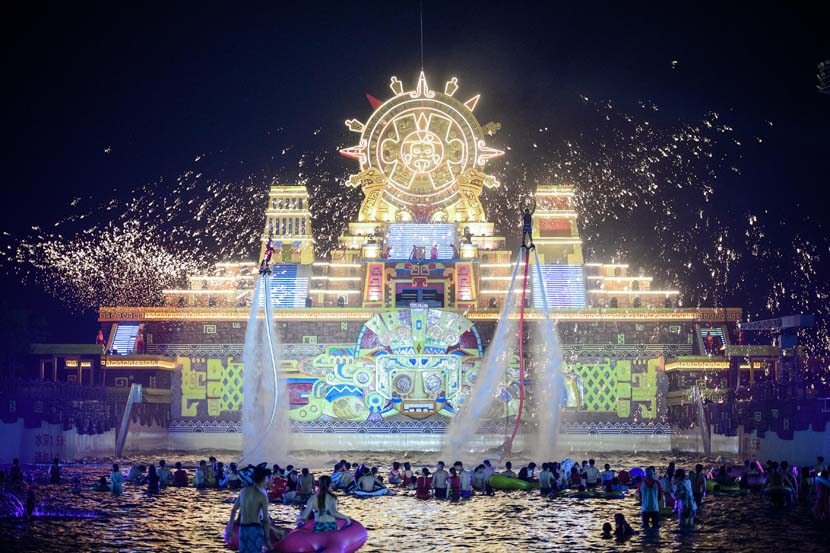 Tourists enjoy a night at a water park in Tianjin, July 23, 2020. Tong Yu/CNS/People Visual