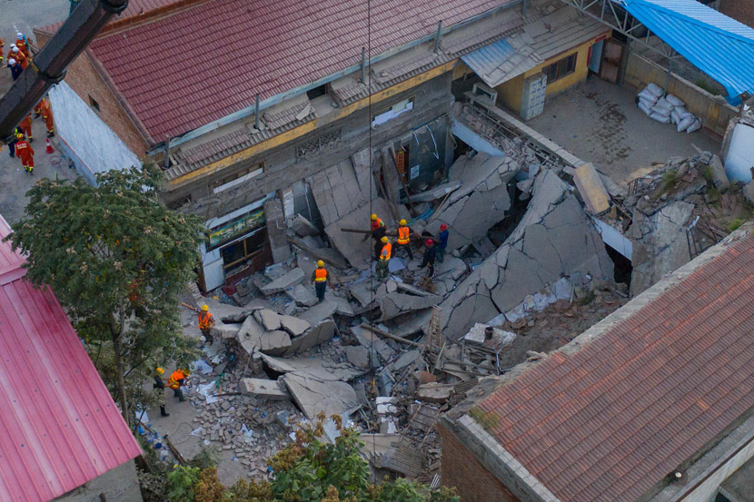An aerial view of a rescue operation at a collapsed restaurant in Xiangfen County, Shanxi province, Aug. 29, 2020. Fifty-seven people had been pulled out of the debris of the collapsed two-story building, including 29 dead, seven severely injured, and 21 slightly injured. Wu Junjie/CNS/People Visual