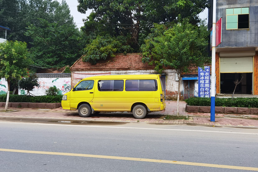 A crematorium van is parked on a roadside in Lizhuang Village, Shandong province, Aug. 6, 2020. Yuan Suwen for Sixth Tone