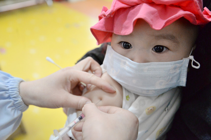 A baby receives a routine vaccination in Handan, Hebei province, April 25, 2020. Hao Qunying/People Visual