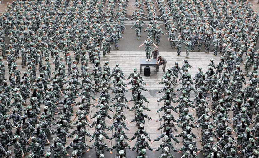 Freshmen receive military training at a college in Chongqing, Oct. 13, 2020. People Visual