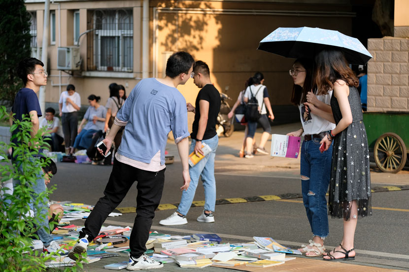 College students at a university flea market in Wuhan, Hubei province, June 10, 2019. People Visual