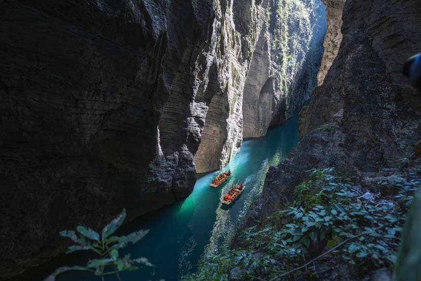 Tourists boat through a gorge in Enshi, Hubei province, Nov. 13, 2020. People Visual
