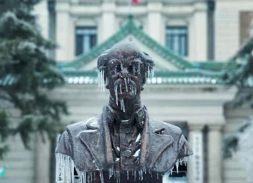 Icicles hang from a statue in Changchun, Jilin province, Nov. 19, 2020. IC
