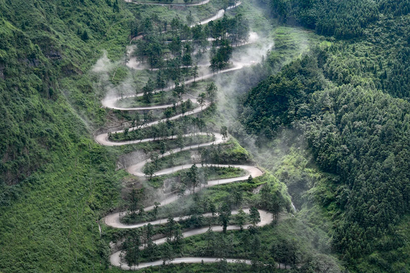 A view of the 24-turn road during a race in Qinglong County, Guizhou province, 2017. He Junyi/CNS/People Visual