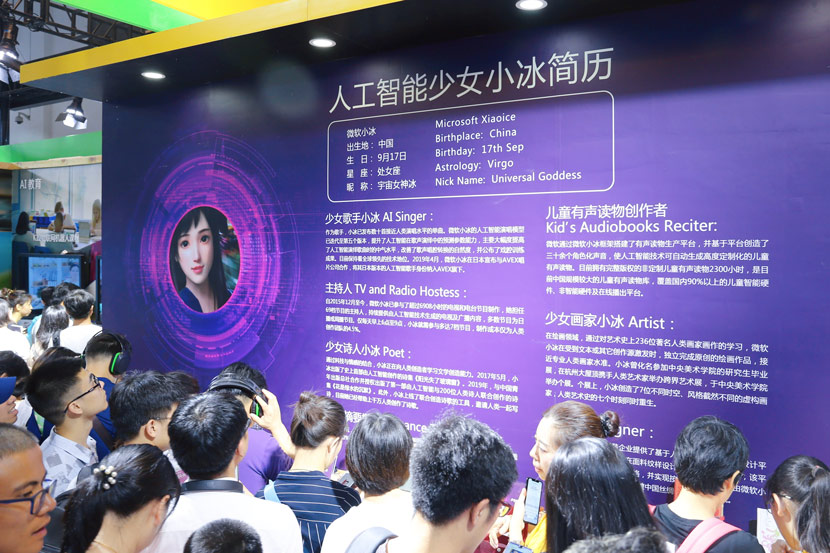 Visitors view the Xiaoice booth at the World Artificial Intelligence Conference 2019 in Shanghai, Aug. 31, 2019. Chen Yuyu/People Visual