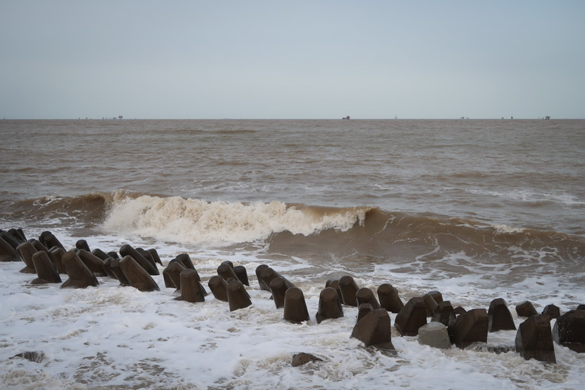Waves batter a sea wall in Dongying, Shandong province, Oct. 27, 2020. People Visual