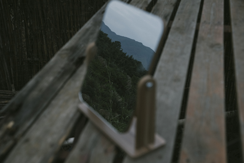 A view of the mountains reflected in a mirror at the commune in rural Fuzhou, Fujian province, Dec. 1, 2020. Shi Yangkun/Sixth Tone