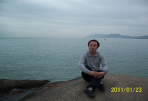 A dated photo of Tuo Jiguang, a journalism professor who killed himself on Oct. 18 following a decadelong resettlement dispute with Chengdu authorities. From Sichuan Normal University