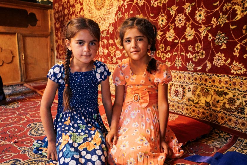 Local children pose for a photo in Langar Village, Tajikistan, July 2018. Courtesy of Liu Zichao