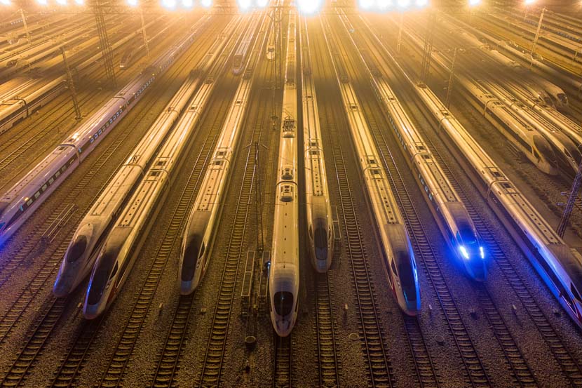 Bullet trains are idle the evening before the first day of the Spring Festival travel period at Guangzhou South Railway Station, Guangdong province, Jan. 28, 2021. People Visual