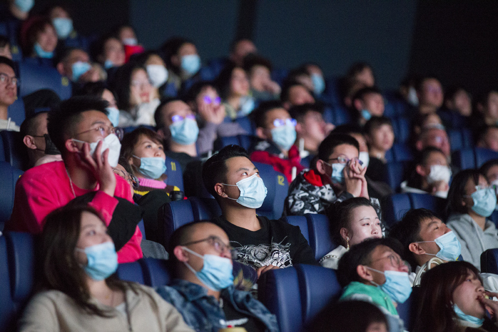 Cinemagoers watch a film in Taiyuan, Shanxi province, Feb. 12, 2021. China’s box office for the 2021 Spring Festival reached over 7.5 billion yuan ($1.6 billion), smashing the holiday record. Zhang Yun/CNS/People Visual