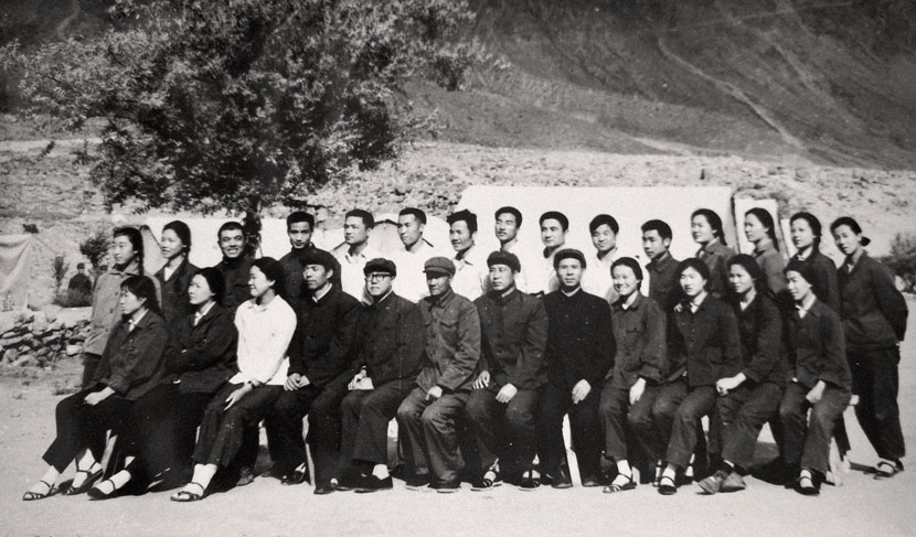 A staff photo from the hospital where Zhang (front row, first from right) worked in Pakistan, 1970s. Courtesy of Zhang Jingdu