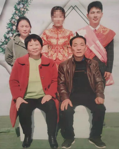Han Shimei and her family pose for a photo during her son’s wedding. Courtesy of Han Shimei