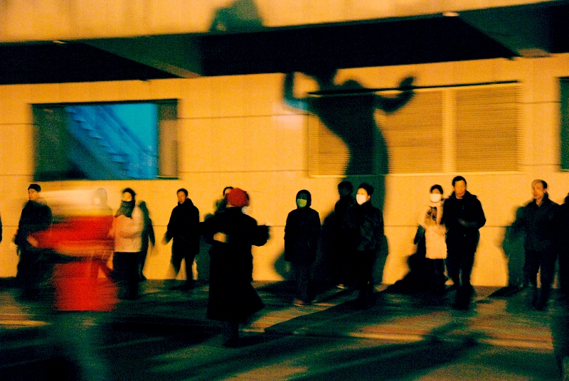 Local residents dance at the in front of a workers’ cultural palace in Northeast China, 2009. Courtesy of Wang Hongzhe