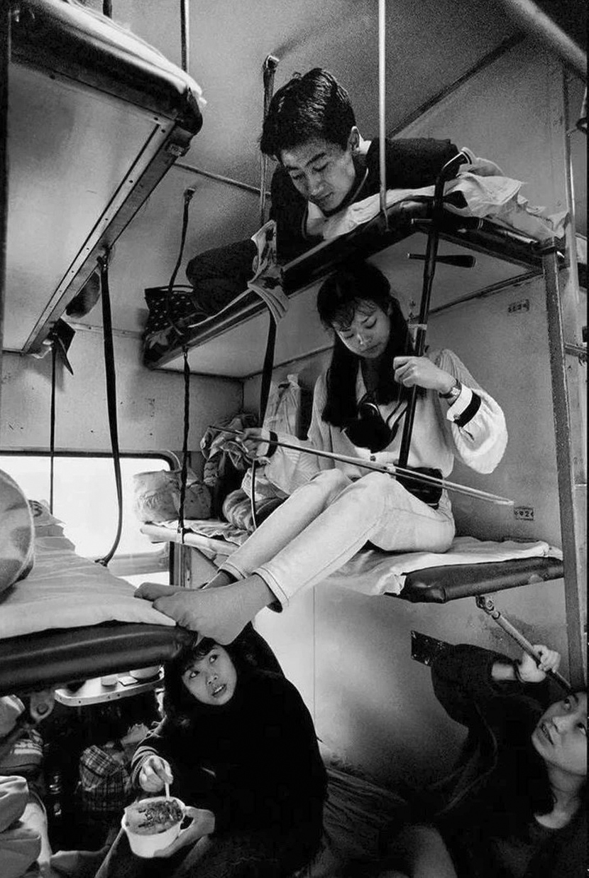 Passengers on a train from Guangzhou to Chengdu in southern China, 1996.  Courtesy of Chinese Photography
