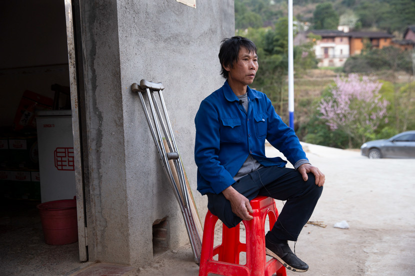 Fan Jiafa sits outside his home in Yanhui Village, Ji’an, Jiangxi province, Feb. 22, 2021. IC