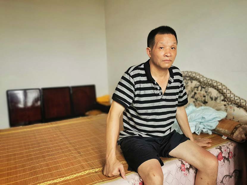 Zhang Yuhuan, who was acquitted after spending 27 years in prison, poses for a photo after returning to his hometown in Jiangxi province, Aug. 9, 2020. People Visual