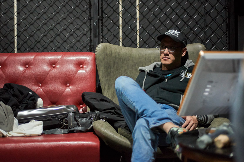 OWE’s vice president, Michael Nee, rests backstage during a gig at Punch Cage, in Shanghai, March 19, 2021. Courtesy of Luiz Vagostelo