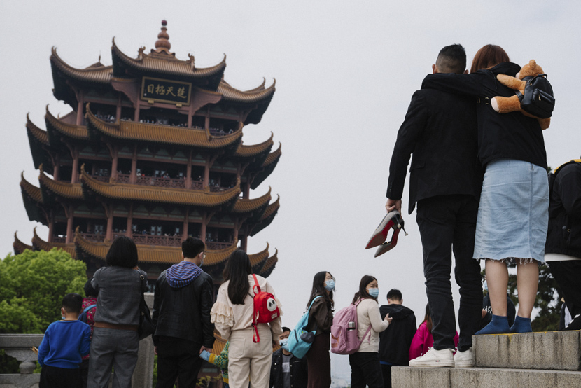 Tourists visit the Yellow Crane Tower, a famous sightseeing destination in Wuhan, Hubei province, April 4, 2021. Shi Yangkun/Sixth Tone