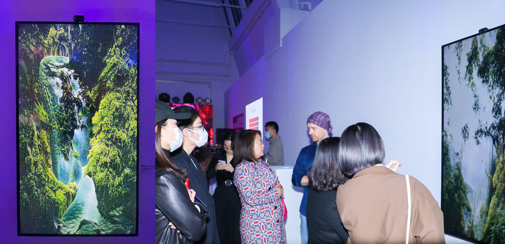 Left: Celyn Bricker’s work “After the Rain”; Right: Celyn Bricker introduces his work to visitors at the exhibition, at UCCA, Beijing, March 2021. Courtesy of BCA