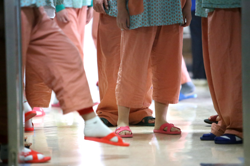 Patients play in the corridor of a ward at a children’s mental health center in Beijing, 2014. Wang Cheng/People Visual