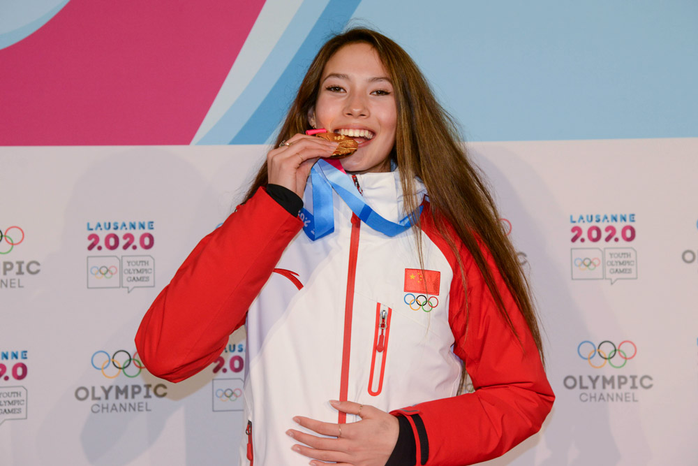 Eileen Gu poses with her gold medal from the Women’s Freeski Halfpipe event in the 2020 Winter Youth Olympic Games in Lausanne, Switzerland, Jan. 21, 2020. Christopher Levy/ZUMA Wire/People Visual