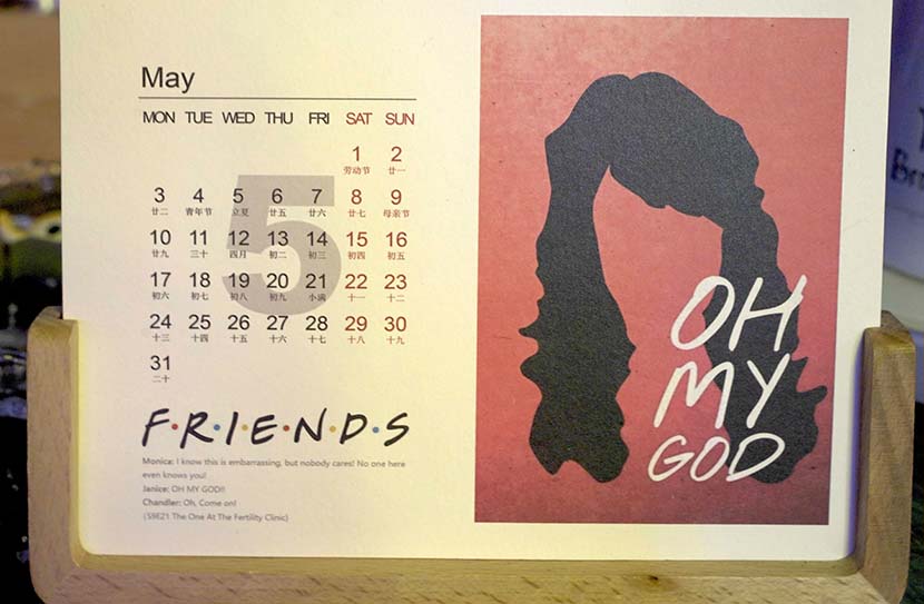 A “Friends”-themed calendar is displayed inside the Central Perk café, in Hangzhou, Zhejiang province, May 11, 2021. Xintian Wang for Sixth Tone