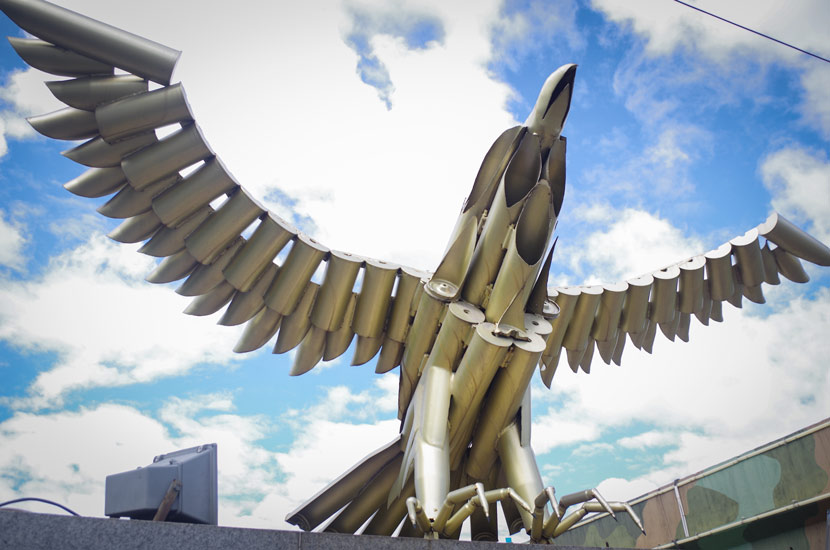An eagle statue made of shell cases is displayed near Baotou Northern Weaponry City in Baotou, Inner Mongolia Autonomous Region, Jan. 1, 2012. Courtesy of Wang Ziyan