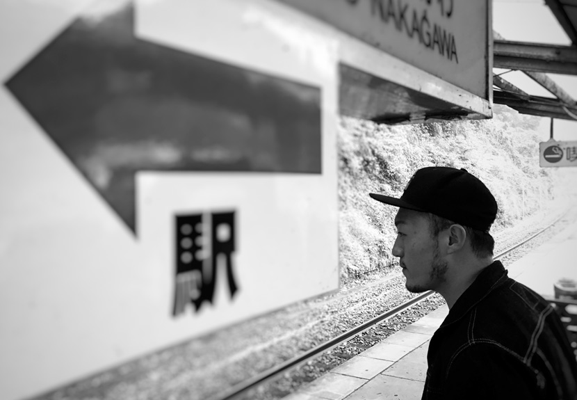 Hu Boyu poses for a photo at a railway station during his trip to Japan, Oct. 21, 2016. Courtesy of Hu Boyu