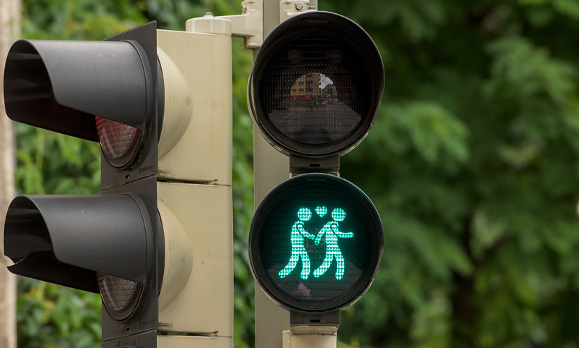 A pedestrian crossing signal shows a gay couple at an intersection in Munich, Germany, July 14, 2015. Joerg Koch/Getty Images/VCG
