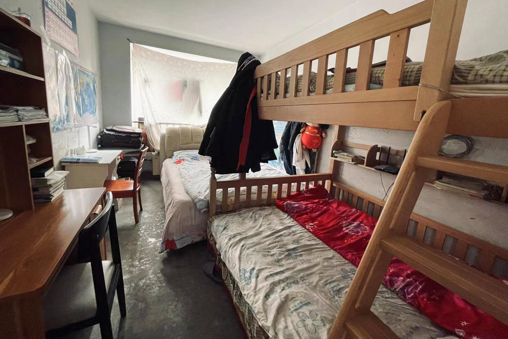 The bedroom of Shen Junliang’s three sons, in Jinan, Shandong province, March 2021. Courtesy of Zhang Yali