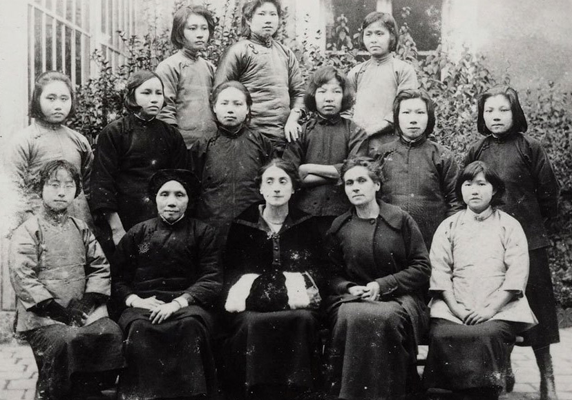 A group photo of female Chinese students and French teachers in Montargis, France, 1920. Ge Jianhao is seated in the front row, second from left. Her daughter Cai Chang is standing in the second row, far right. From Women Today Weekly
