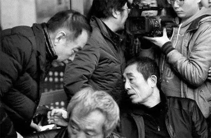 Chen Kaige (left), Tian Zhuanghuang (front bottom), and Zhang Yimou (right bottom) attend a memorial for director Wu Tianming, in Beijing, March 2014. From Oriental Morning Post