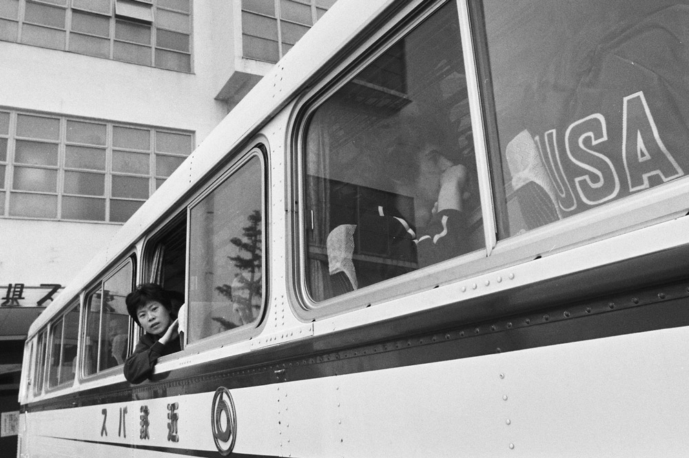 Glenn Cowan (right) of the United State is seen sitting on the Chinese team bus during the 31st World Table Tennis Championships in Nagoya, Aichi, Japan, April 4, 1971. The Asahi Shimbun via Getty Images