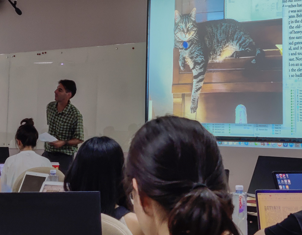 Peter Hessler shows a photo of his pet cat during his last class at Sichuan University, July 1, 2021. Courtesy of He Yujia
