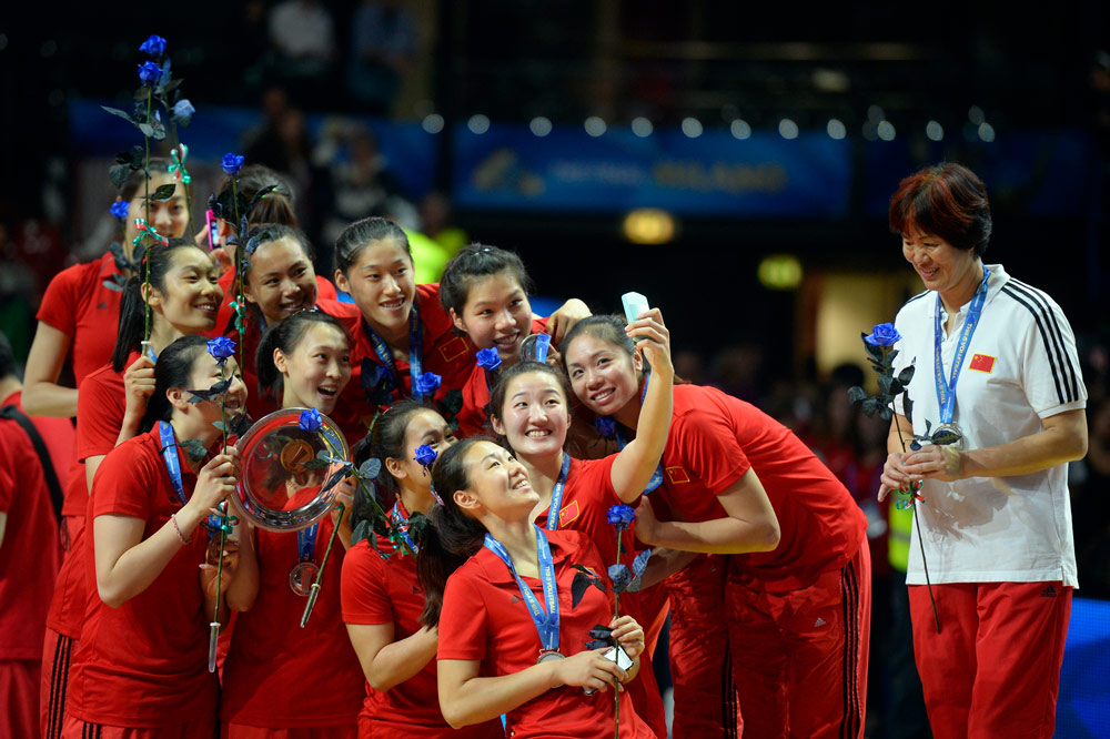 Chinese women’s volleyball team members take a selfie celebrating their silver medal at the Volleyball Women’s World Championship in Milan, Italy, Oct. 12, 2014. Olivier Morin/AFP via People Visual