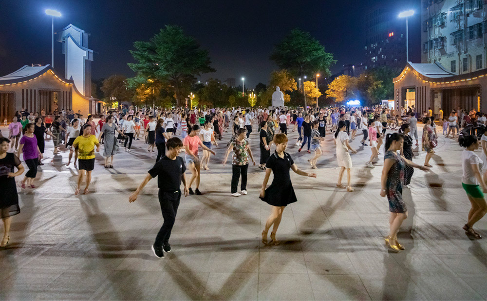 People dance at a square in Shenzhen, Guangdong province, 2019. Zhong Yiwu/People Visual