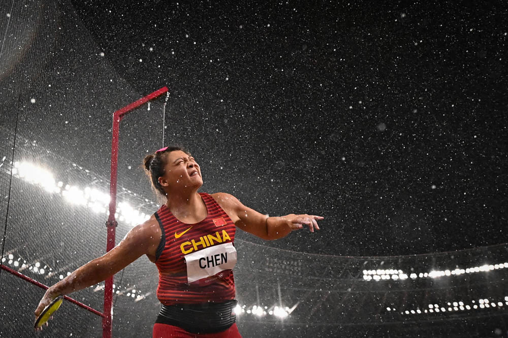 Chen Yang competes in the women’s discus throw final, Aug. 2, 2021. Ben Stansall/AFP via People Visual