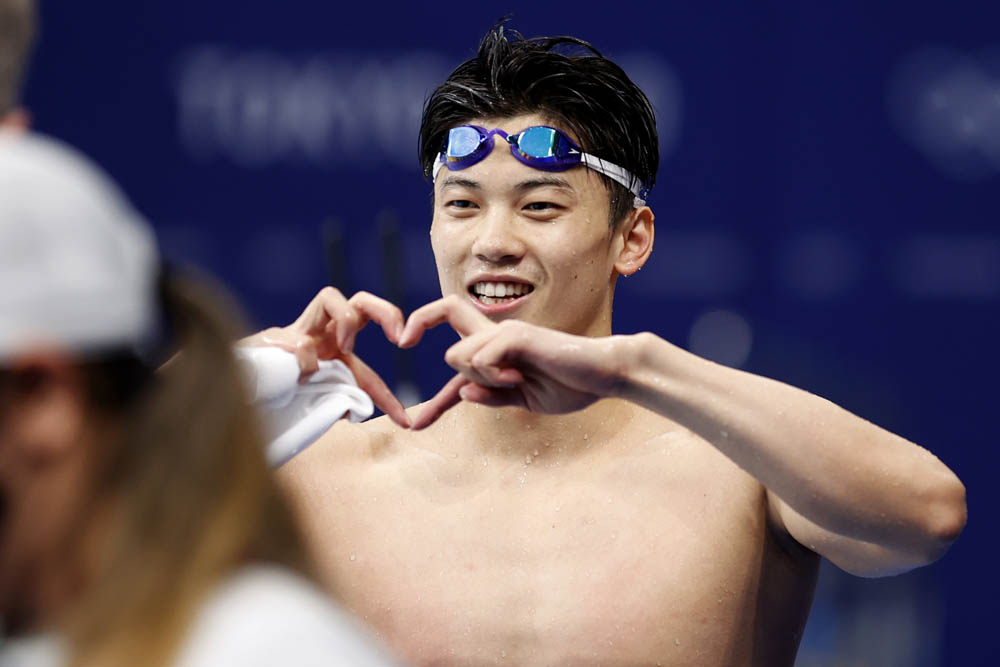 Swimmer Wang Shun poses for a photo after winning the 200-meter individual medley final, July 30, 2021. Fu Tian/CNS/People Visual