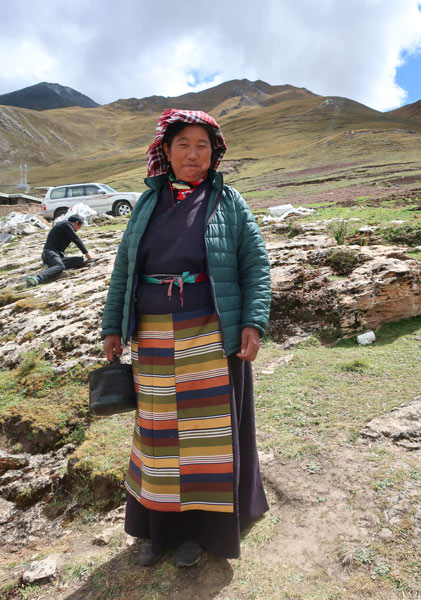 A local woman poses for a photo in Tibet Autonomous Region, 2018. Courtesy of David Dian Zhang