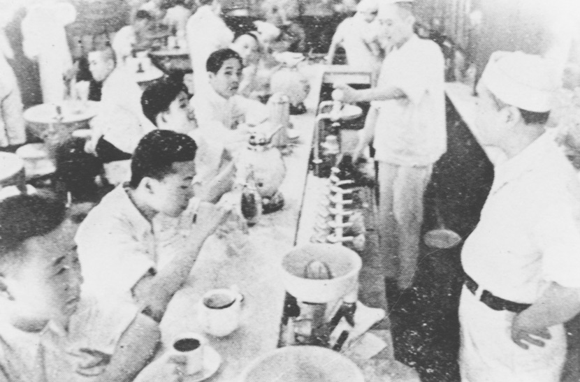 People snack on ice cream at a cold drink store in Shanghai, 1930s-1940s. From Shanghai Library