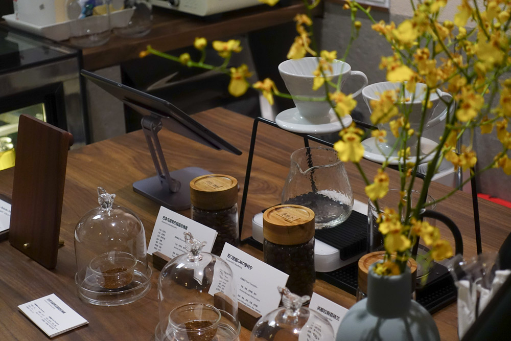 Coffee beans on display at Jojo Tang’s PPT Café, Shanghai, Aug. 21, 2021. Courtesy of PPT Cafe