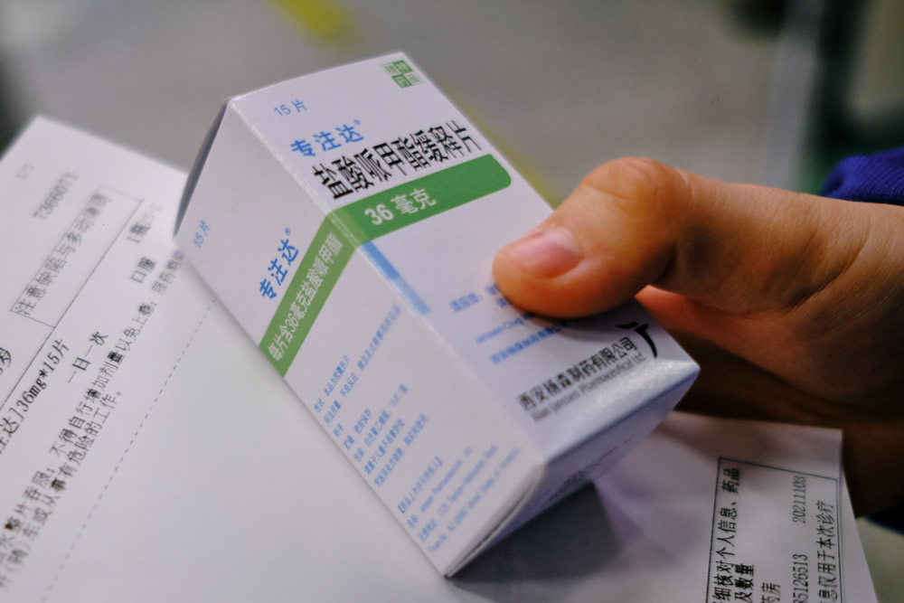 A patient holds a box of Concerta, a stimulant used to treat ADHD, in Hangzhou, Zhejiang province, November 2021. Wu Huiyuan/Sixth Tone