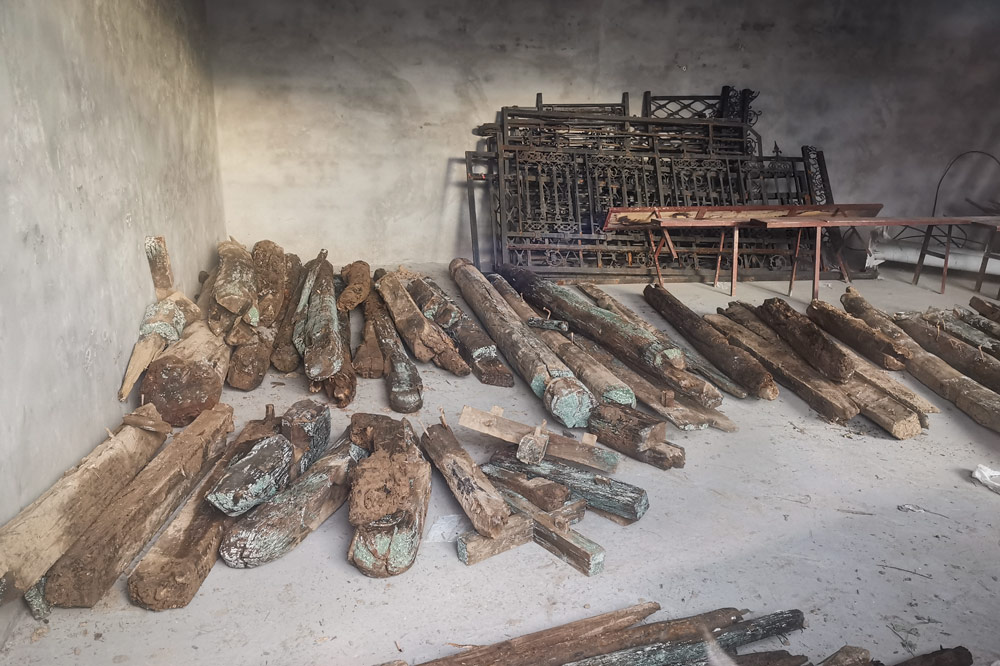 Wood salvaged from the tower is stored and tabulated by the village committee in hopes that it can for future restoration work, Yanjiazhuang Village, Shanxi province, Oct. 14, 2021. Zhu Ying/The Paper