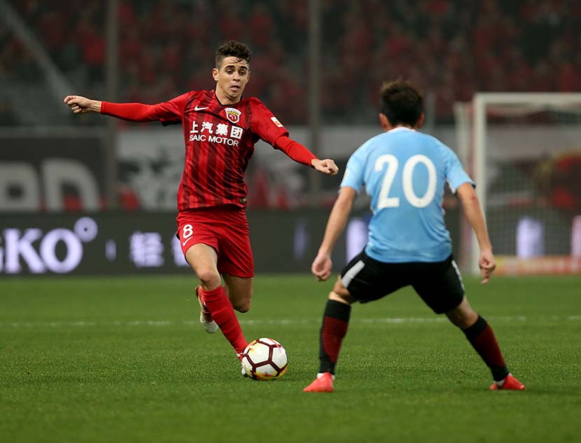 Brazilian forward Oscar plays for Shanghai SIPG during a Chinese Super League match, March 3, 2018. People Visual