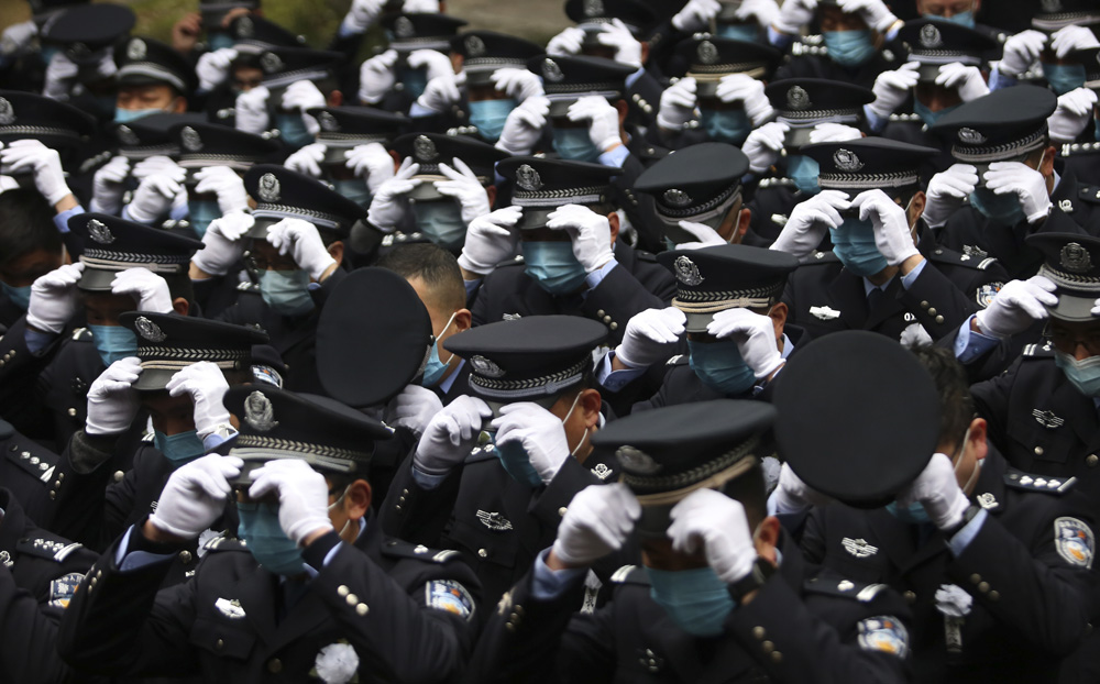 A funeral ceremony for 33-year-old police officer Ji Yuekan in Hangzhou, Zhejiang province, Jan. 31, 2021. People Visual