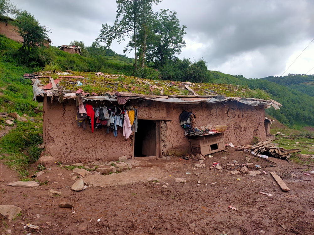 An exterior view of a dilapidated production facility belonging to Axi’s family, Zhaojue County, Sichuan province, July 2021. Courtesy of Ji Guangxu